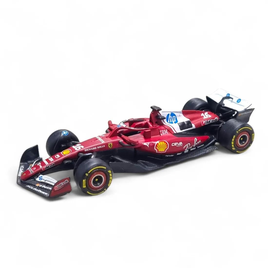 Model of a Formula 1 car with visible branding on a white background