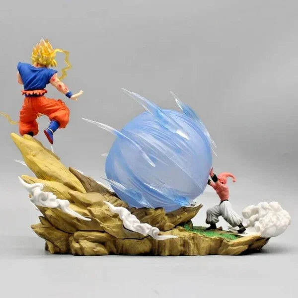 Dragon Ball action figure of Super Saiyan Goku vs Buu with energy bomb on rocky base
