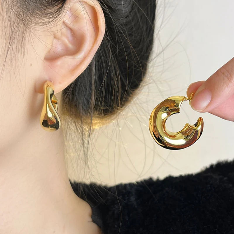 C-Shaped Golden Hoop Earrings – Minimal Chunky Circle Design