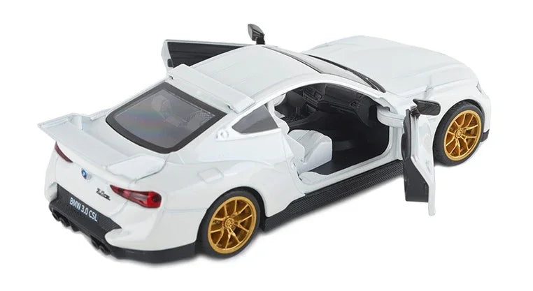 BMW 3.0 CSL alloy diecast car model toy, white with gold wheels, doors open, side view