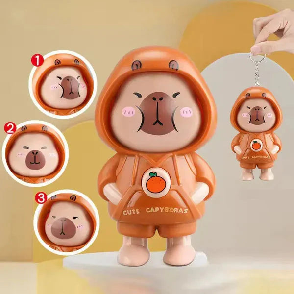 Cute Capybara Face‑Changing Rubber Keychain – Hoodie Mini Figure with 3 Expressions