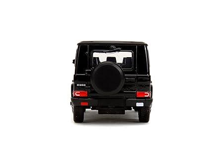 Black diecast AMG G65 toy car model rear view, off-road vehicle collectible
