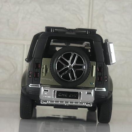 Die-cast Defender pull-back toy car model rear view with open tail gate and visible spare tire