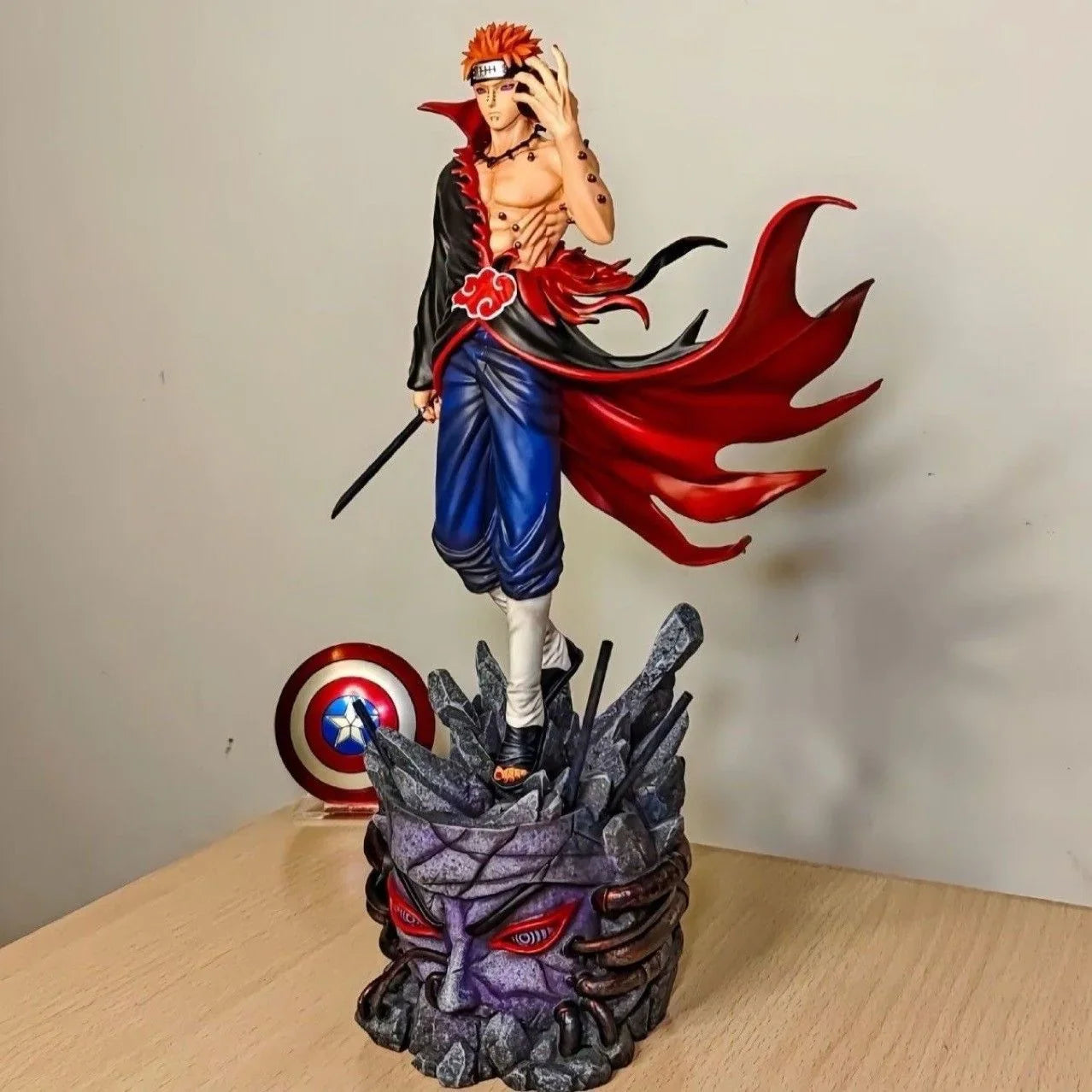 Naruto Shippuden Pain 30cm anime statue on Shinra Tensei rock base on a desk