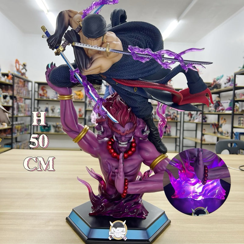 Large figurine with a purple and black design on a wooden surface, with shelves in the background.