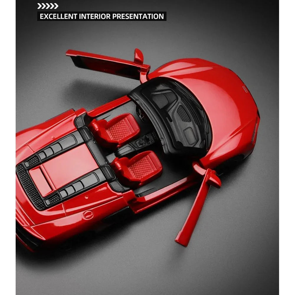 Red Audi R8 Spyder V10 diecast model car with open doors and detailed interior on display