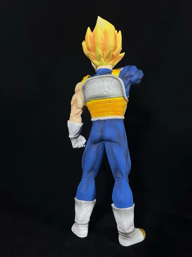 Vegeta action figure with yellow hair and blue armor suit on black background