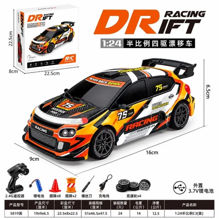 1:24 scale yellow and black 4WD RC drift racing car with 2.4GHz remote control, rechargeable battery, spare wheels, road barriers and traffic cones.