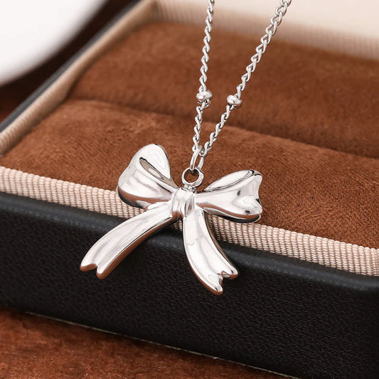 Minimalist Silver Bow Pendant Necklace – Elegant Ribbon Chain Jewelry