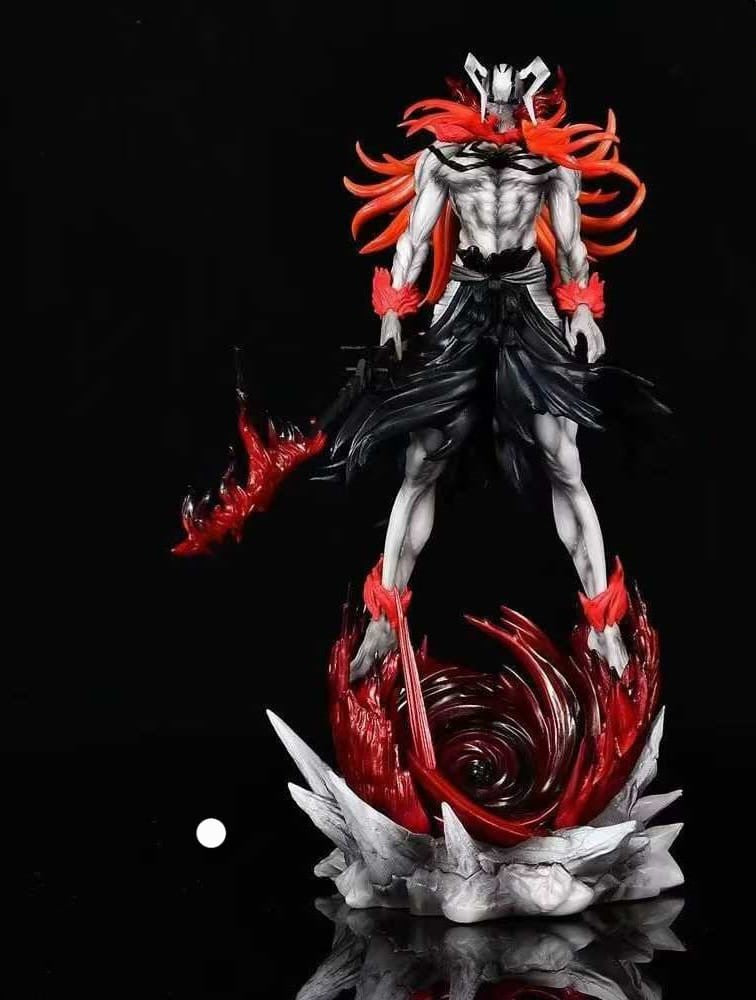 Detailed figurine with red and black design on a dark background