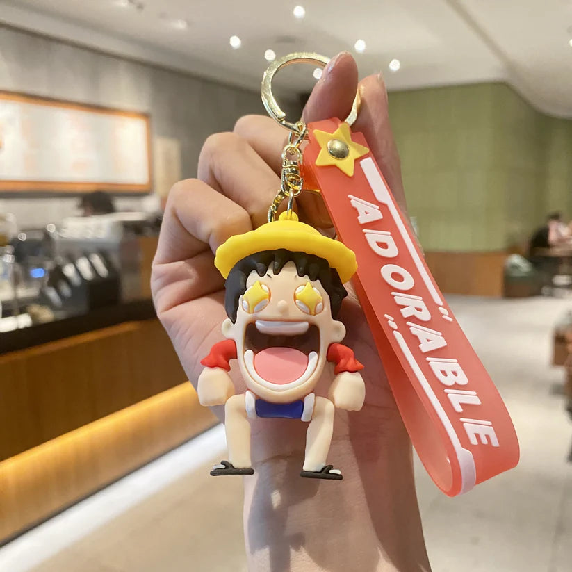 Luffy Excited Rubber Keychain with Orange Strap – 3D Chibi Figure, Gold Ring + Clasp