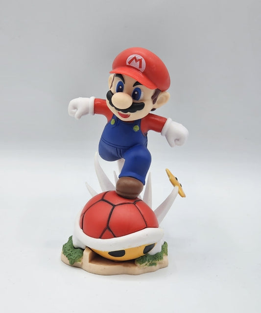 Super Mario 15 cm Collectible Figure – Jump Pose on Spiked Turtle Shell Base
