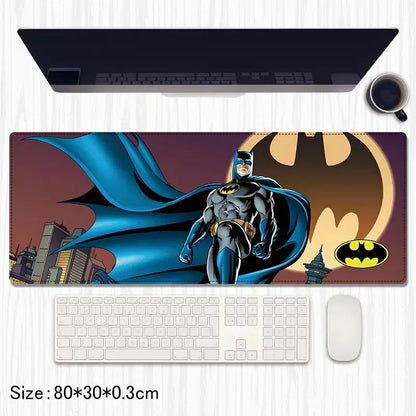 Batman desk mat with Gotham City skyline and Bat-Signal, size 80x30 cm, on white desk