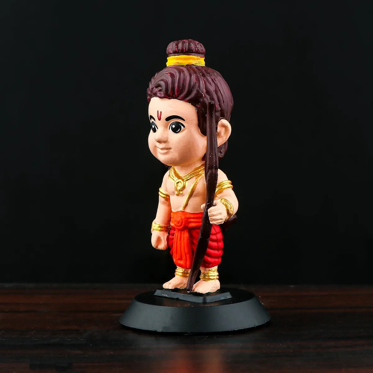 Shri Ram Bobblehead – 11 cm Bow‑Holding Idol with Red Dhoti on Round Pedestal